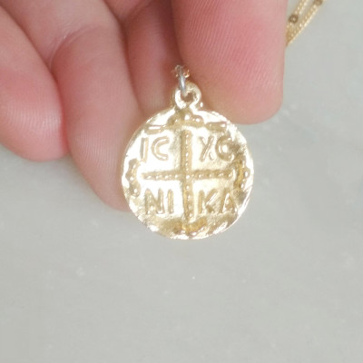 icxc nika pendant protection charm 10110